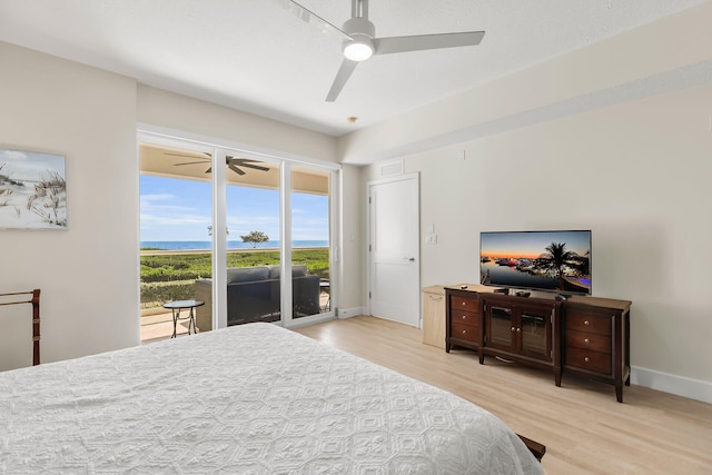 bedroom with ceiling fan, access to exterior, and light wood-type flooring