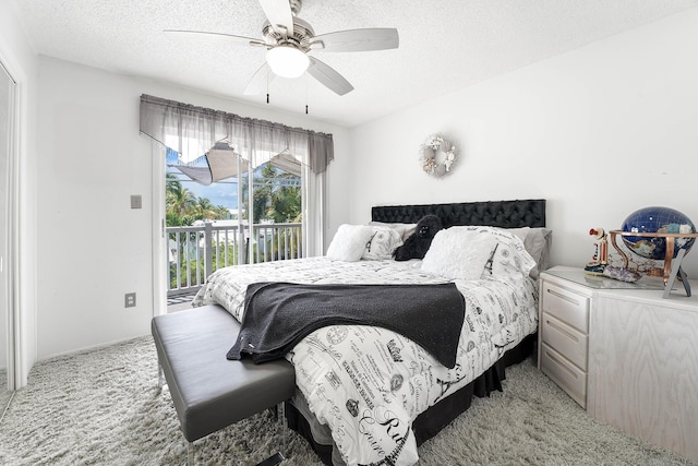 bedroom featuring ceiling fan, access to exterior, light carpet, and a textured ceiling