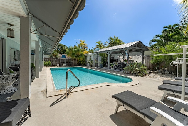 view of pool with a gazebo and a patio