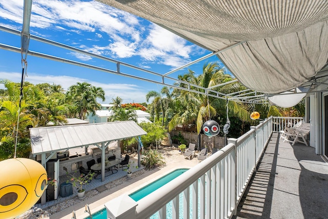 balcony featuring a patio area