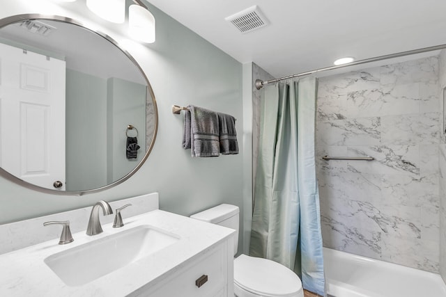 full bathroom featuring vanity, toilet, and shower / bath combo