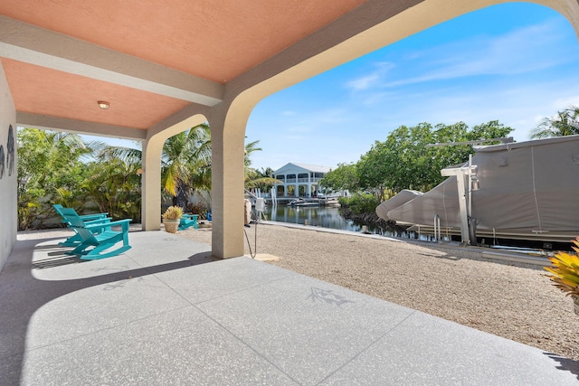 view of patio / terrace featuring a water view
