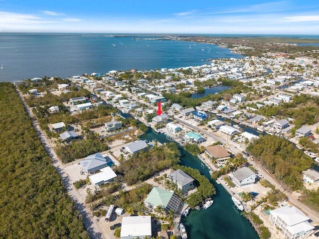 aerial view with a water view and a residential view