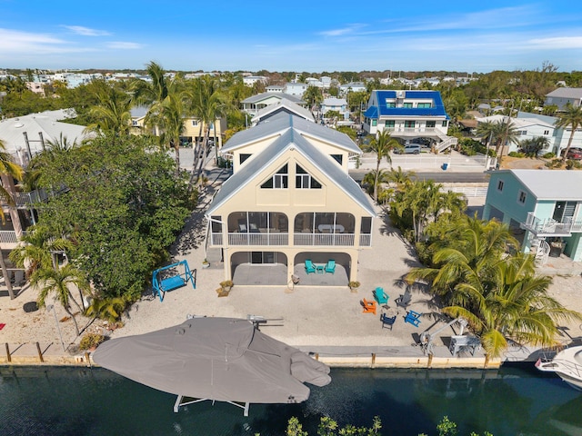 birds eye view of property with a residential view