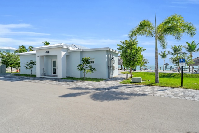 view of front of house with a front lawn