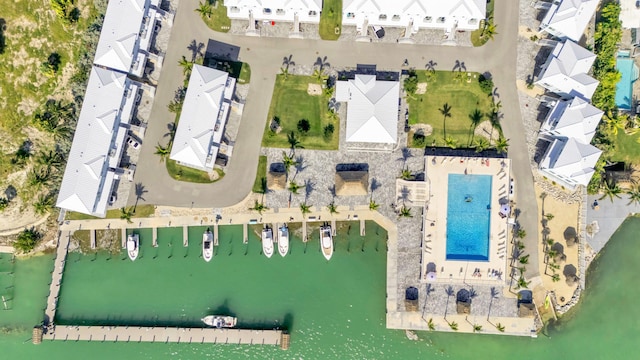 birds eye view of property featuring a water view