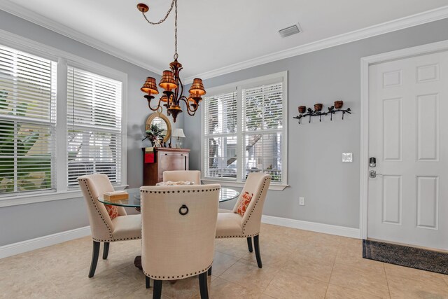 dining area featuring a notable chandelier, crown molding, a wealth of natural light, and light tile patterned floors