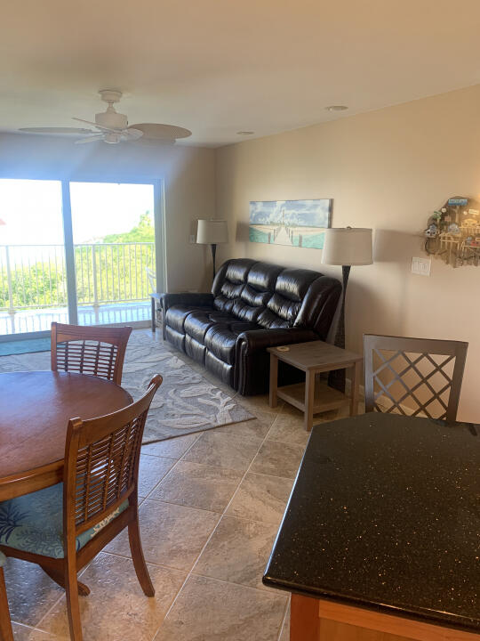 living room with ceiling fan