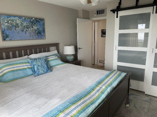 bedroom with a barn door