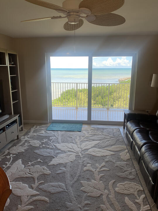 bedroom with access to exterior and ceiling fan