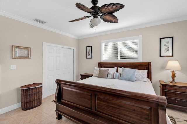 bedroom with light tile patterned floors, visible vents, a ceiling fan, ornamental molding, and a closet