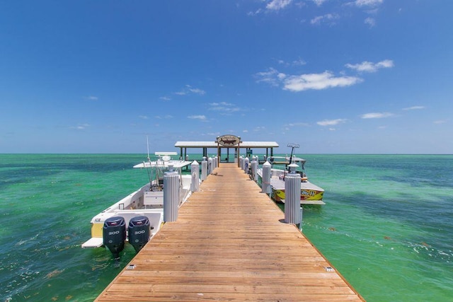 dock area featuring a water view