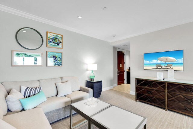 carpeted living room with crown molding