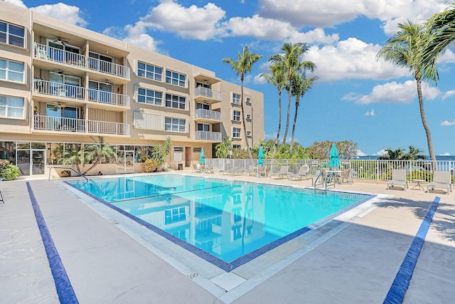 view of swimming pool with a patio area