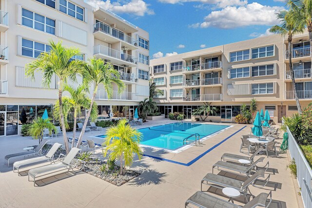 view of swimming pool with a patio area