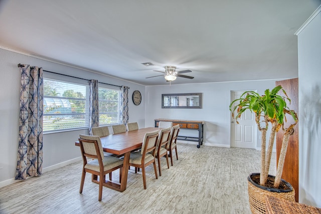 dining area featuring ceiling fan and light hardwood / wood-style flooring