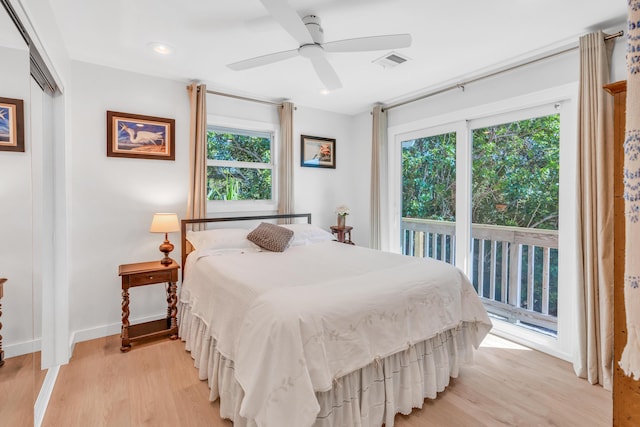 bedroom with ceiling fan, access to exterior, and light wood-type flooring