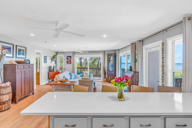 kitchen featuring light hardwood / wood-style floors and ceiling fan