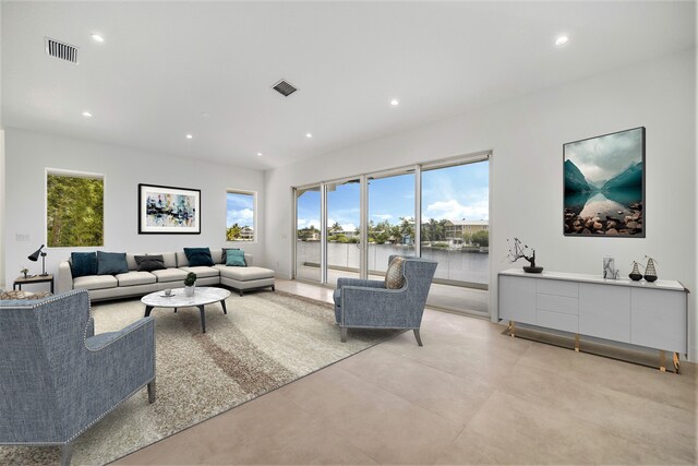 living room featuring a water view