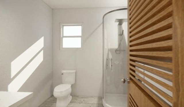 bathroom with toilet and walk in shower