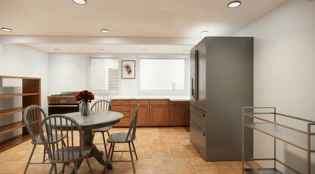 kitchen featuring high end fridge