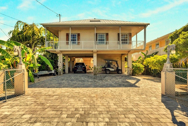 view of front of house featuring a carport