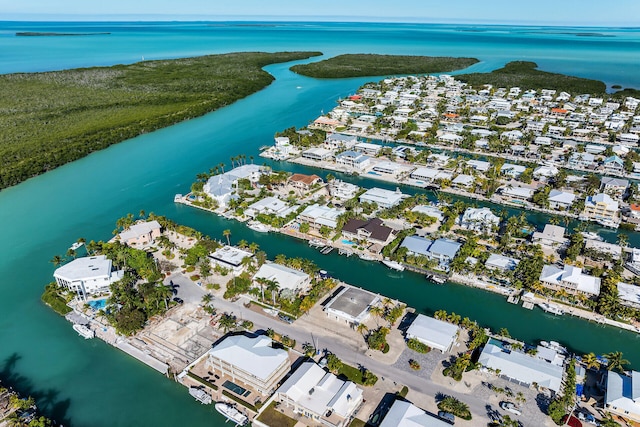 aerial view with a water view and a residential view