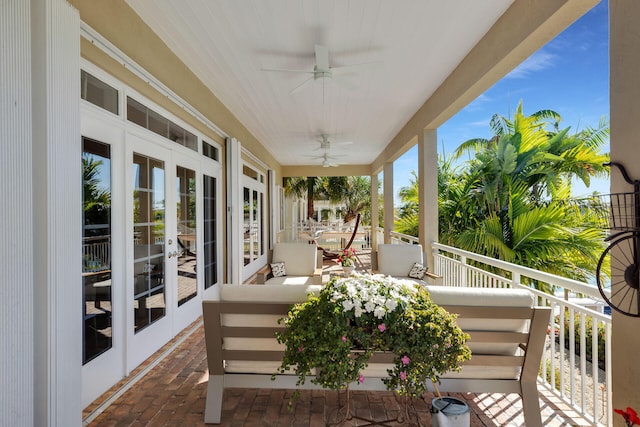 exterior space featuring french doors and ceiling fan