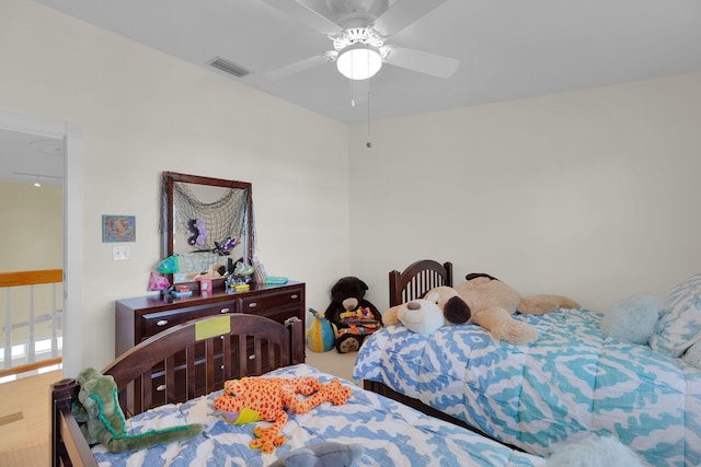 bedroom with visible vents and ceiling fan