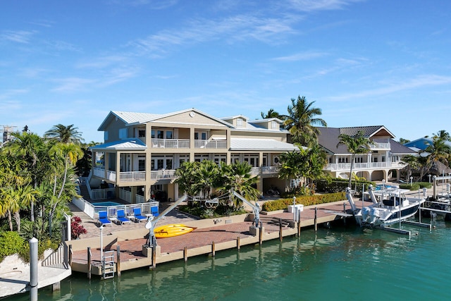 view of dock with a water view