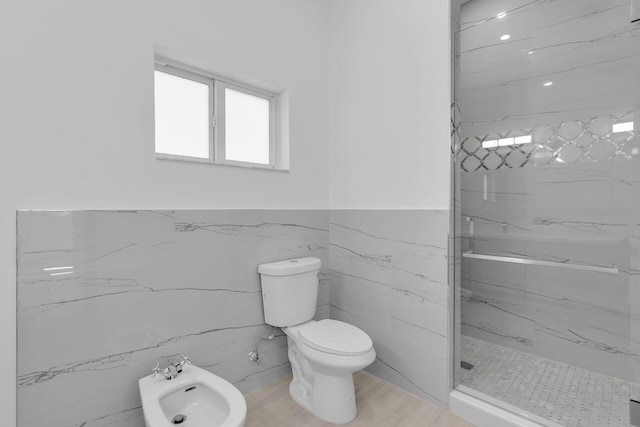 14 Tarpon Ave, Key Largo, FL 33037 - full bathroom featuring a marble finish shower, a bidet, a wainscoted wall, tile walls, and wood finished floors