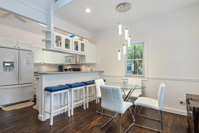 817 Terry Ln, Key West, FL 33040 - dining area with dark wood-type flooring and recessed lighting