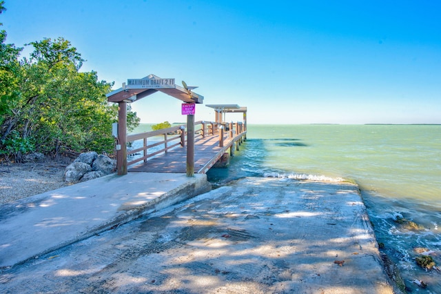 view of dock with a water view