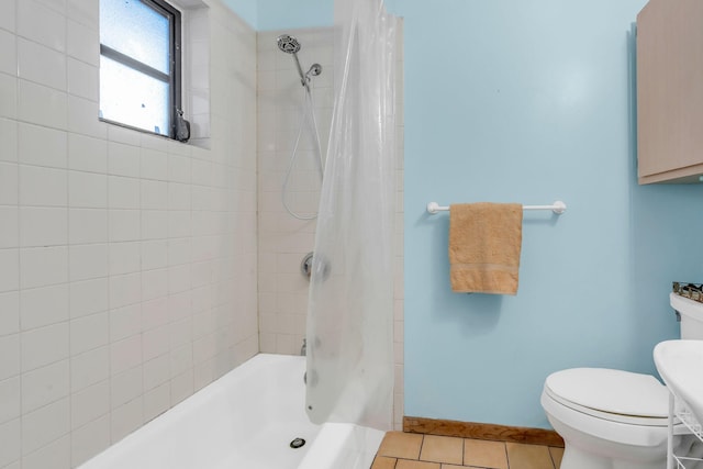 bathroom with shower / bathtub combination with curtain, toilet, and tile patterned flooring