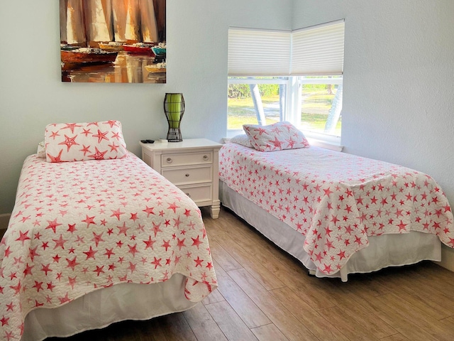 bedroom with light wood-type flooring