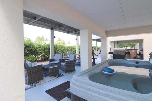 12400 Overseas Hwy Unit 9, Marathon, FL 33050 - view of patio / terrace with outdoor lounge area, a grill, and a hot tub