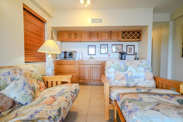 564 Sombrero Beach Rd, Marathon, FL 33050 - living room featuring bar with sink and light tile patterned floors