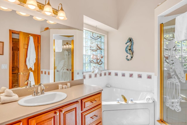 564 Sombrero Beach Rd, Marathon, FL 33050 - full bathroom featuring vanity, a garden tub, and a shower with shower door