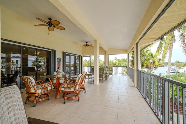 564 Sombrero Beach Rd, Marathon, FL 33050 - view of patio / terrace featuring ceiling fan, a balcony, and a water view