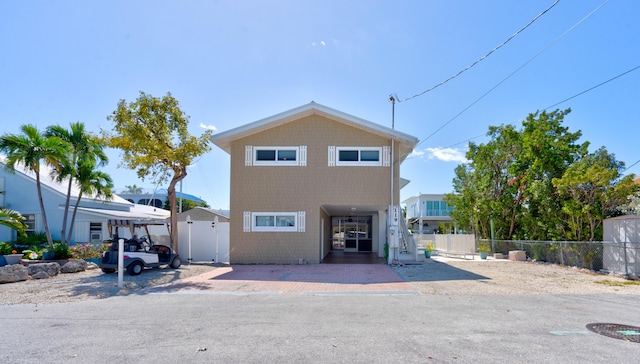 view of front of home with a carport