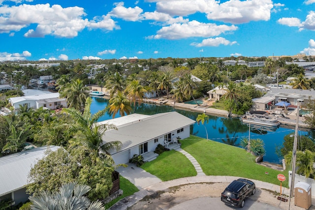 drone / aerial view with a water view