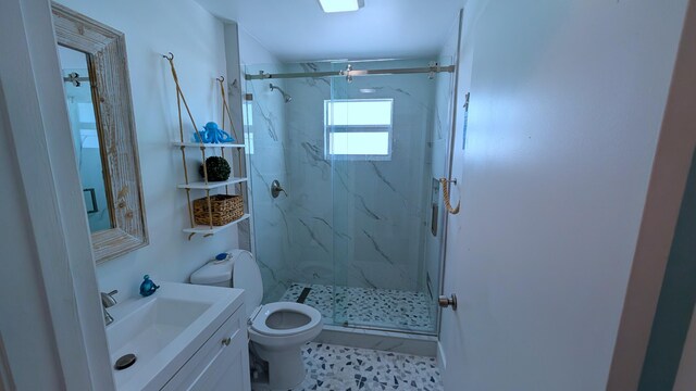 22961 John Avery Ln, Cudjoe, FL 33042 - full bath featuring toilet, a marble finish shower, and vanity