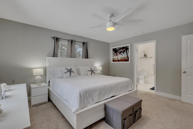 939 Plantation Rd, Key Largo, FL 33037 - bedroom featuring light carpet, connected bathroom, and ceiling fan