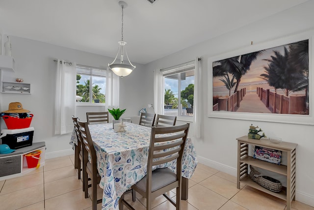 939 Plantation Rd, Key Largo, FL 33037 - dining area featuring light tile patterned flooring