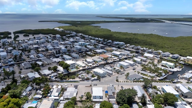 939 Plantation Rd, Key Largo, FL 33037 - aerial view of property and surrounding area featuring a nearby body of water and nearby suburban area