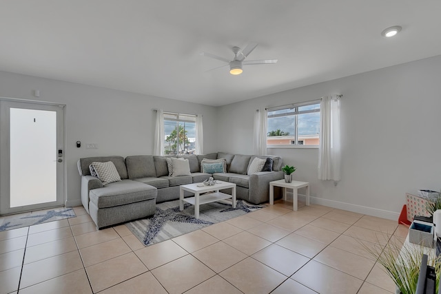 939 Plantation Rd, Key Largo, FL 33037 - living room featuring a ceiling fan, plenty of natural light, and light tile patterned floors