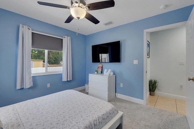 939 Plantation Rd, Key Largo, FL 33037 - bedroom featuring carpet flooring, a ceiling fan, and tile patterned floors