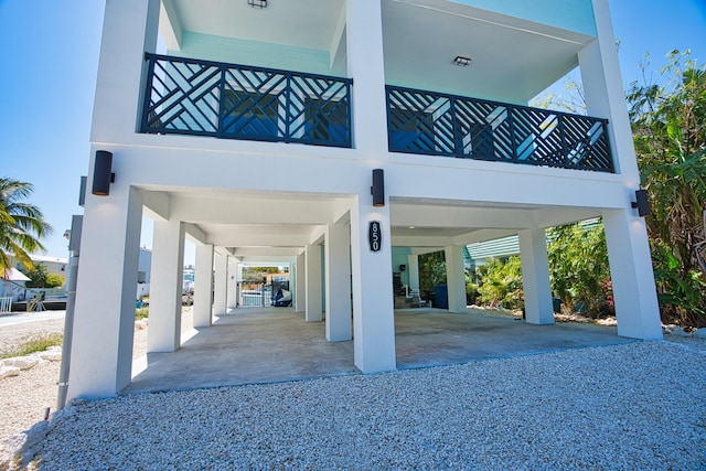 exterior space with a carport