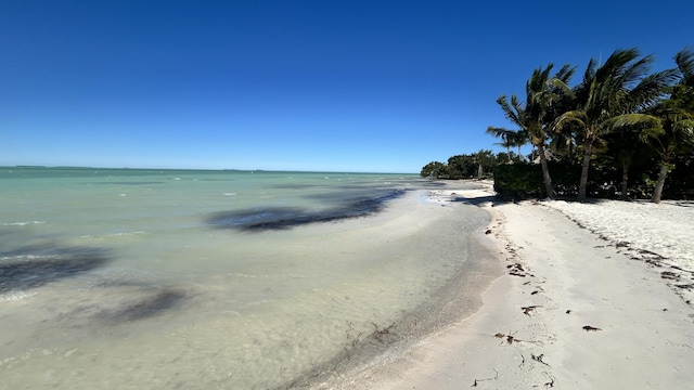 view of water feature with a beach view