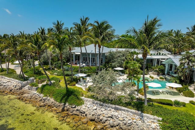 view of community with a pool and a patio area